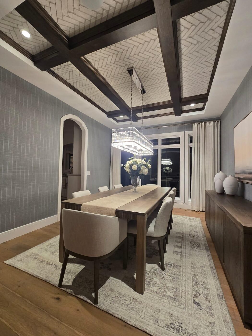 Formal dining room with coffered ceiling and long table, fully cleaned
