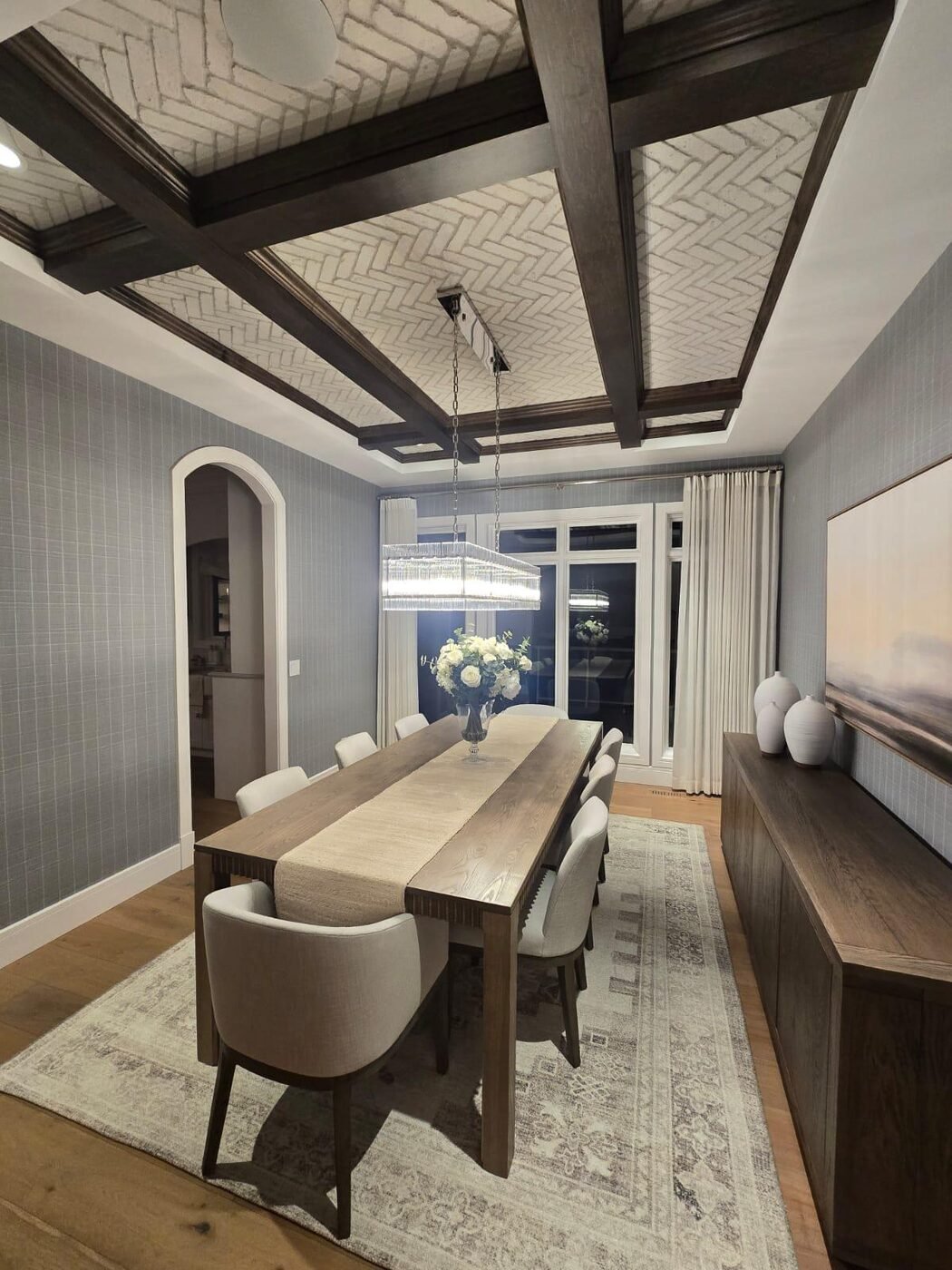 Formal dining room with upholstered chairs and sideboard after cleaning