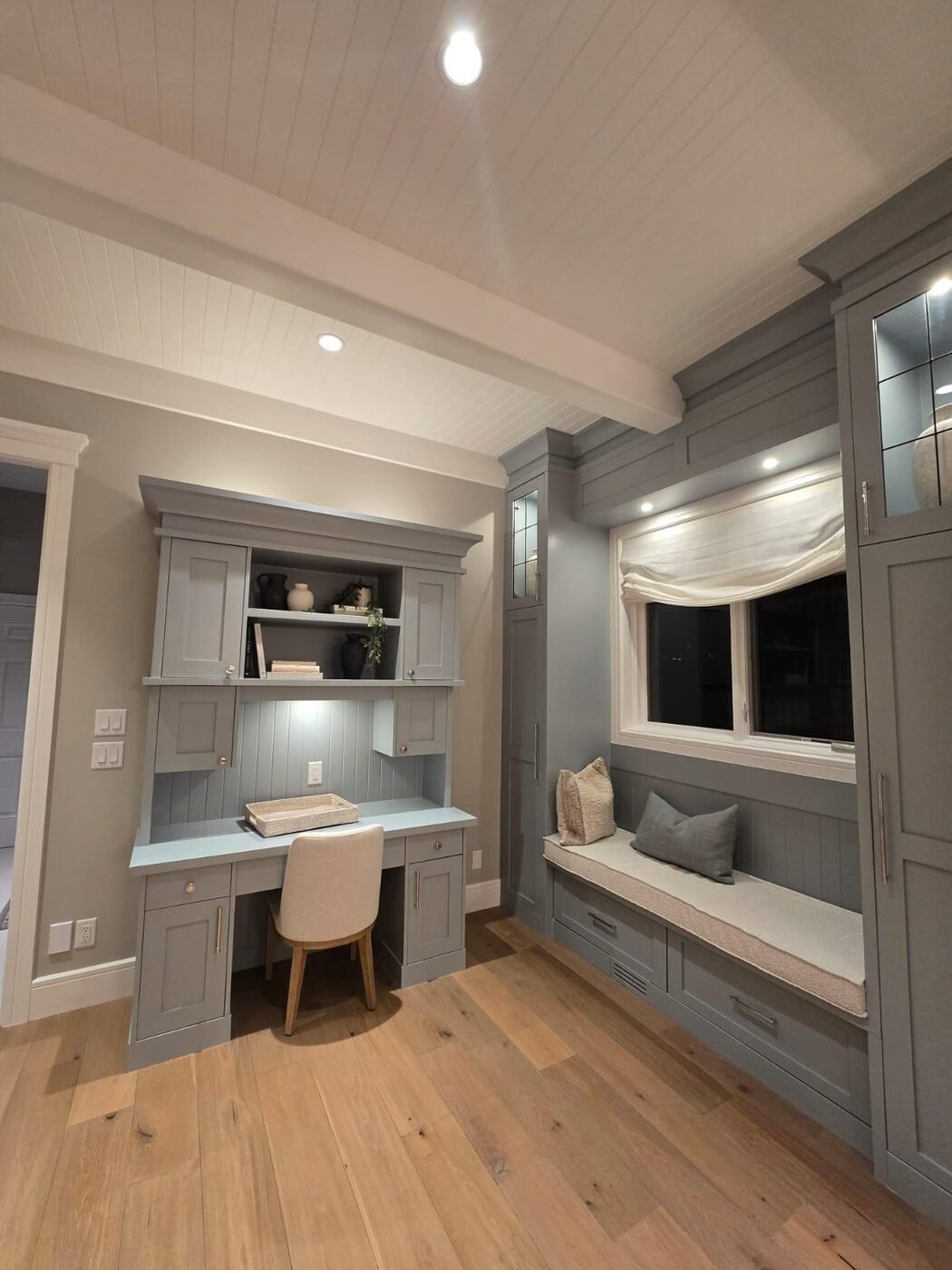 Built-in window seat with cushions and joinery, detail cleaned
